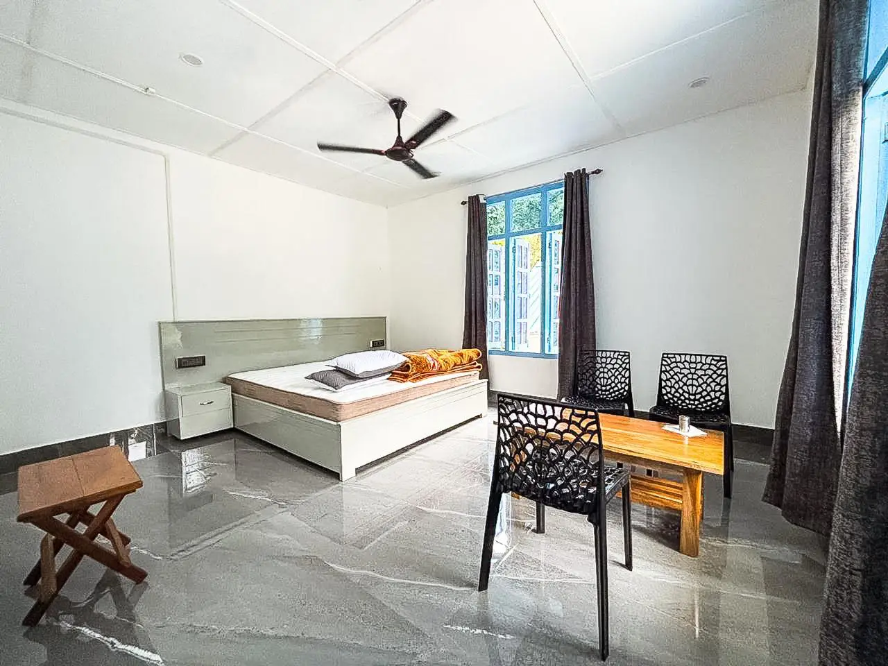 Bright master room with window view